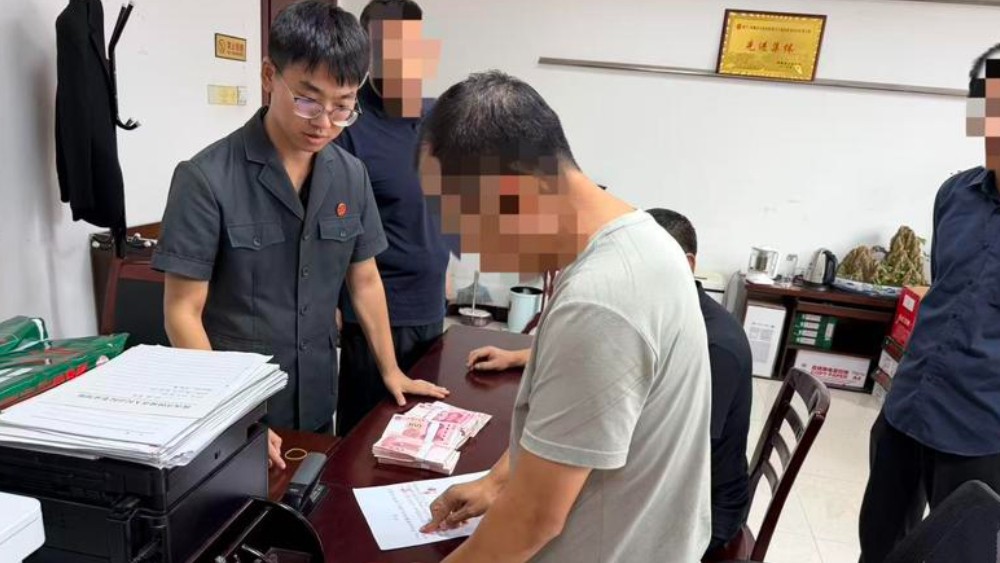 一纸和解消积怨 温情司法暖民心